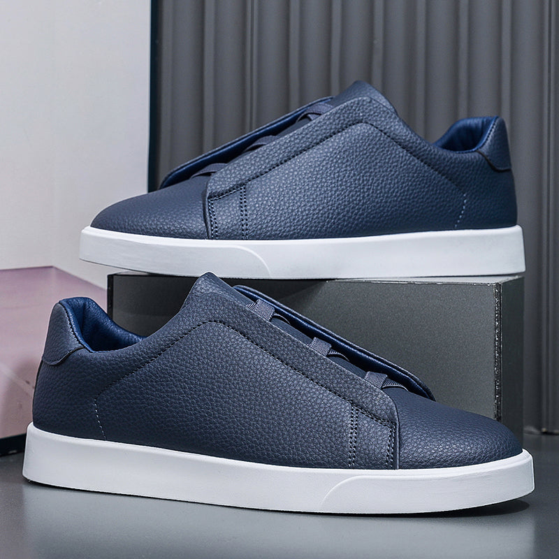 Minimalist Slip-On Sneakers for Men & Women – Lightweight Casual Leather Shoes for Daily Wear.Clean design. Everyday comfort. Effortless style.