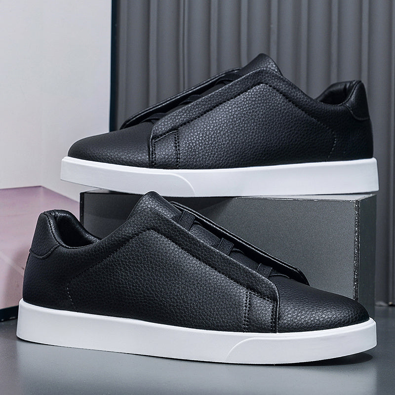 Minimalist Slip-On Sneakers for Men & Women – Lightweight Casual Leather Shoes for Daily Wear.Clean design. Everyday comfort. Effortless style.