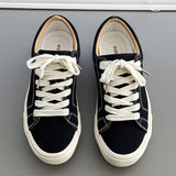 Classic Canvas Sneakers – Everyday Casual Shoes for Daily Comfort  A clean, timeless sneaker designed to match every outfit and every day.