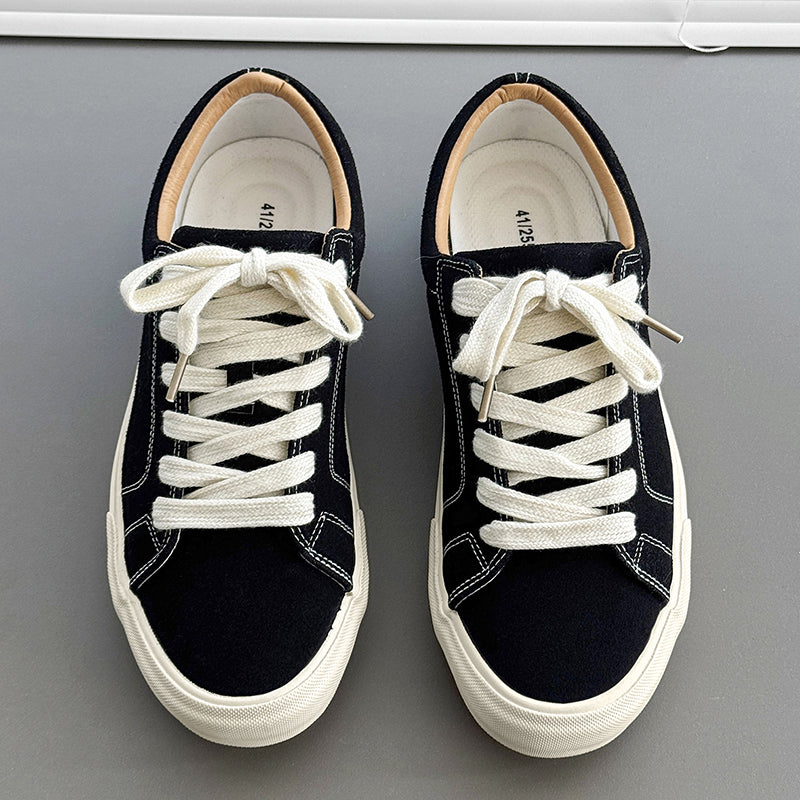 Classic Canvas Sneakers – Everyday Casual Shoes for Daily Comfort  A clean, timeless sneaker designed to match every outfit and every day.