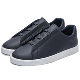 Minimalist Slip-On Sneakers for Men & Women – Lightweight Casual Leather Shoes for Daily Wear.Clean design. Everyday comfort. Effortless style.